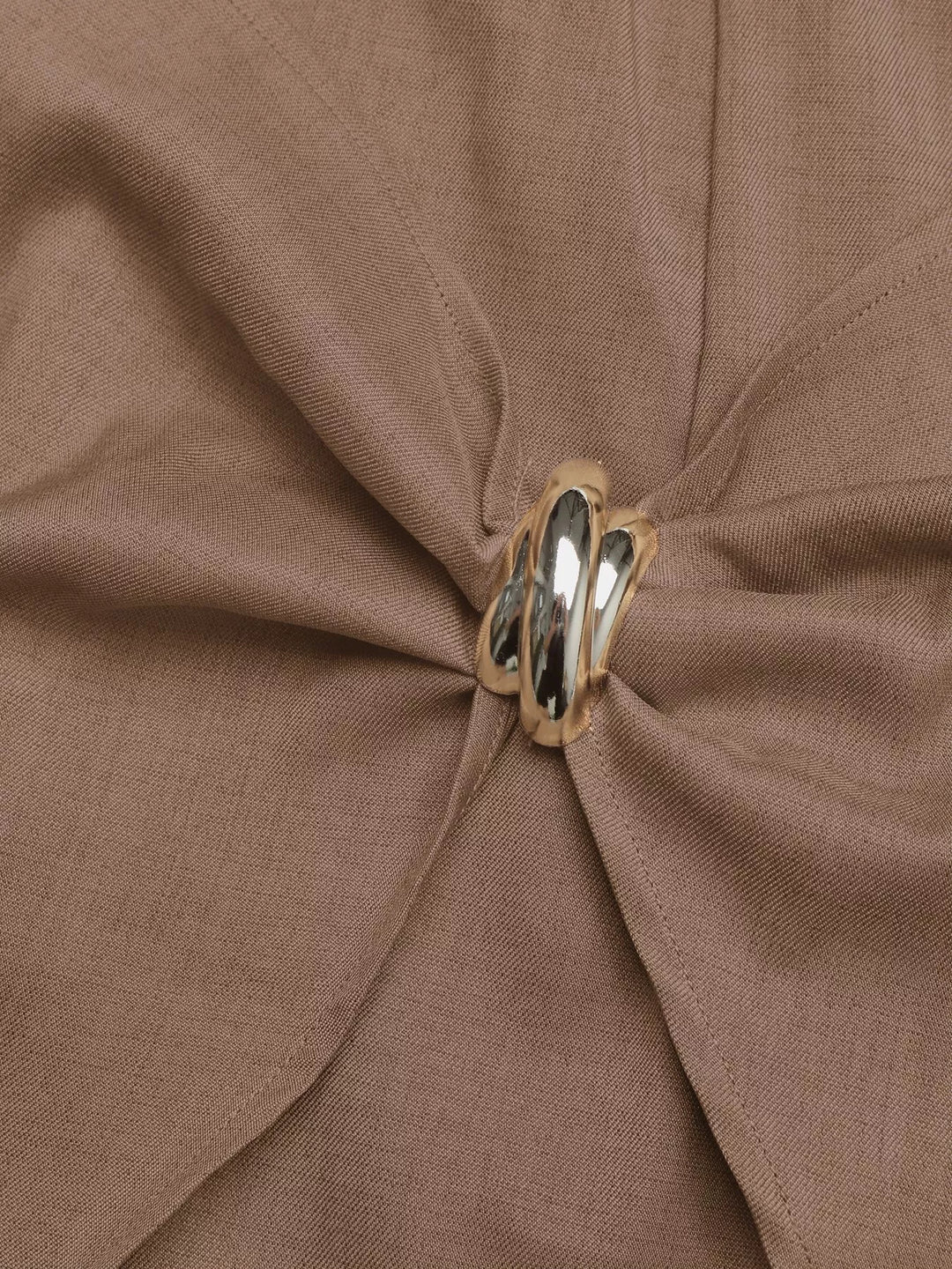 Twist-front high-rise mini skort with gold ring detail