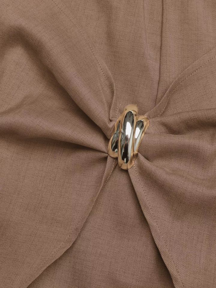 Twist-front high-rise mini skort with gold ring detail
