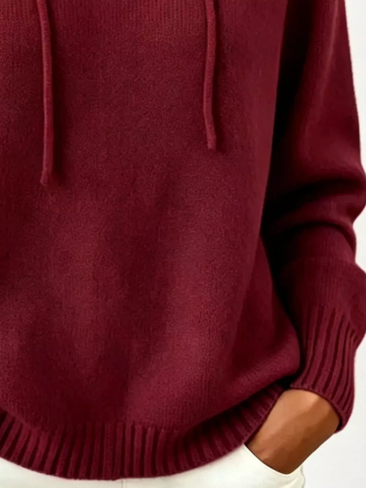 Drawstring hooded knit pullover sweater with ribbed trim