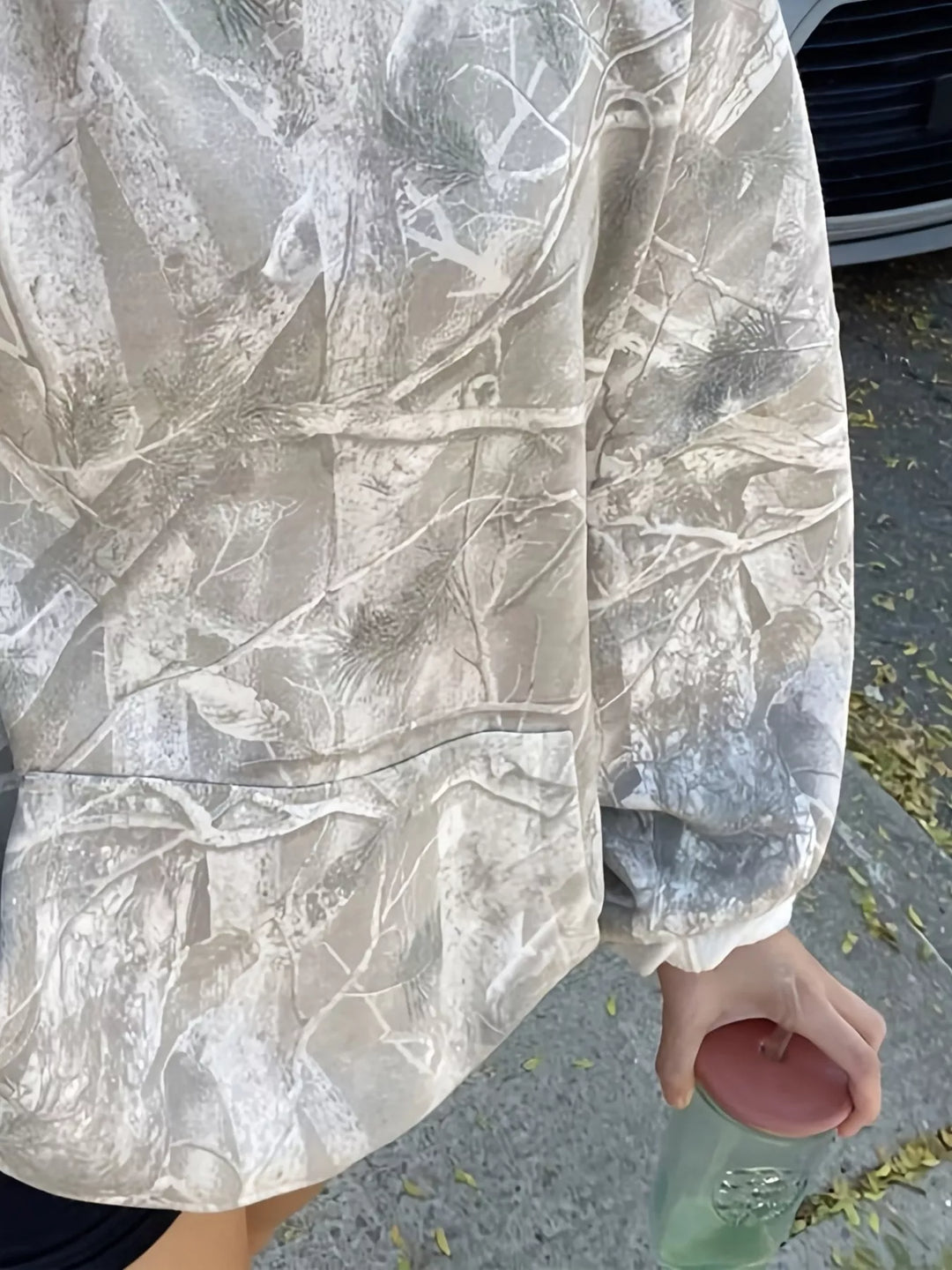 Oversized forest camo pullover hoodie with kangaroo pocket