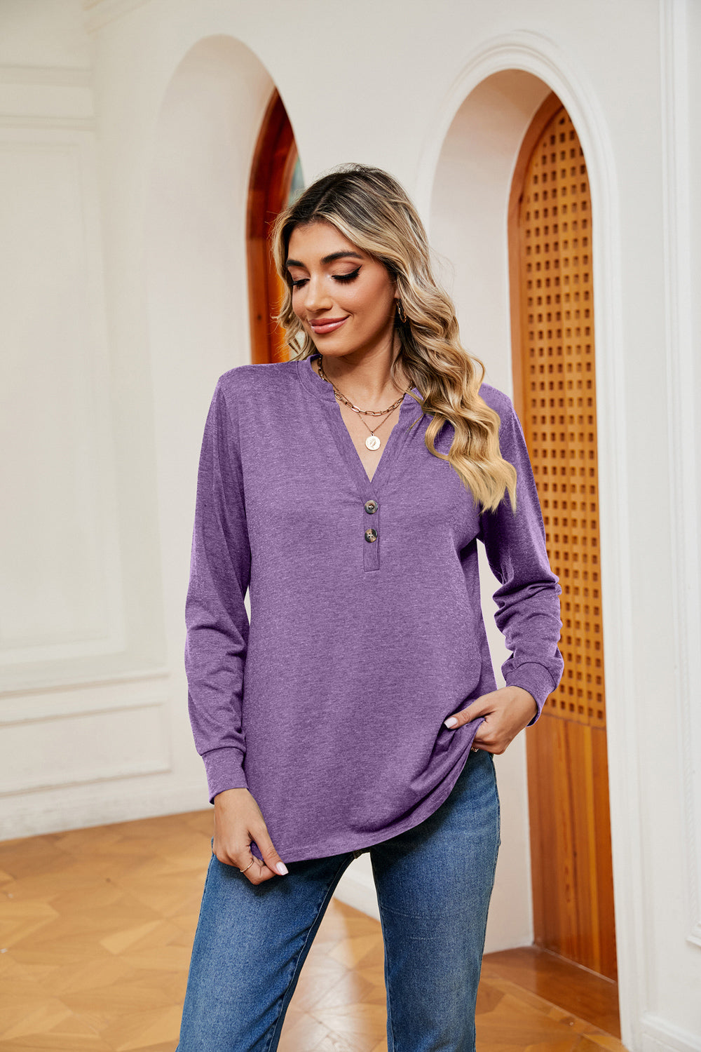 Notch neck long sleeve top with button placket
