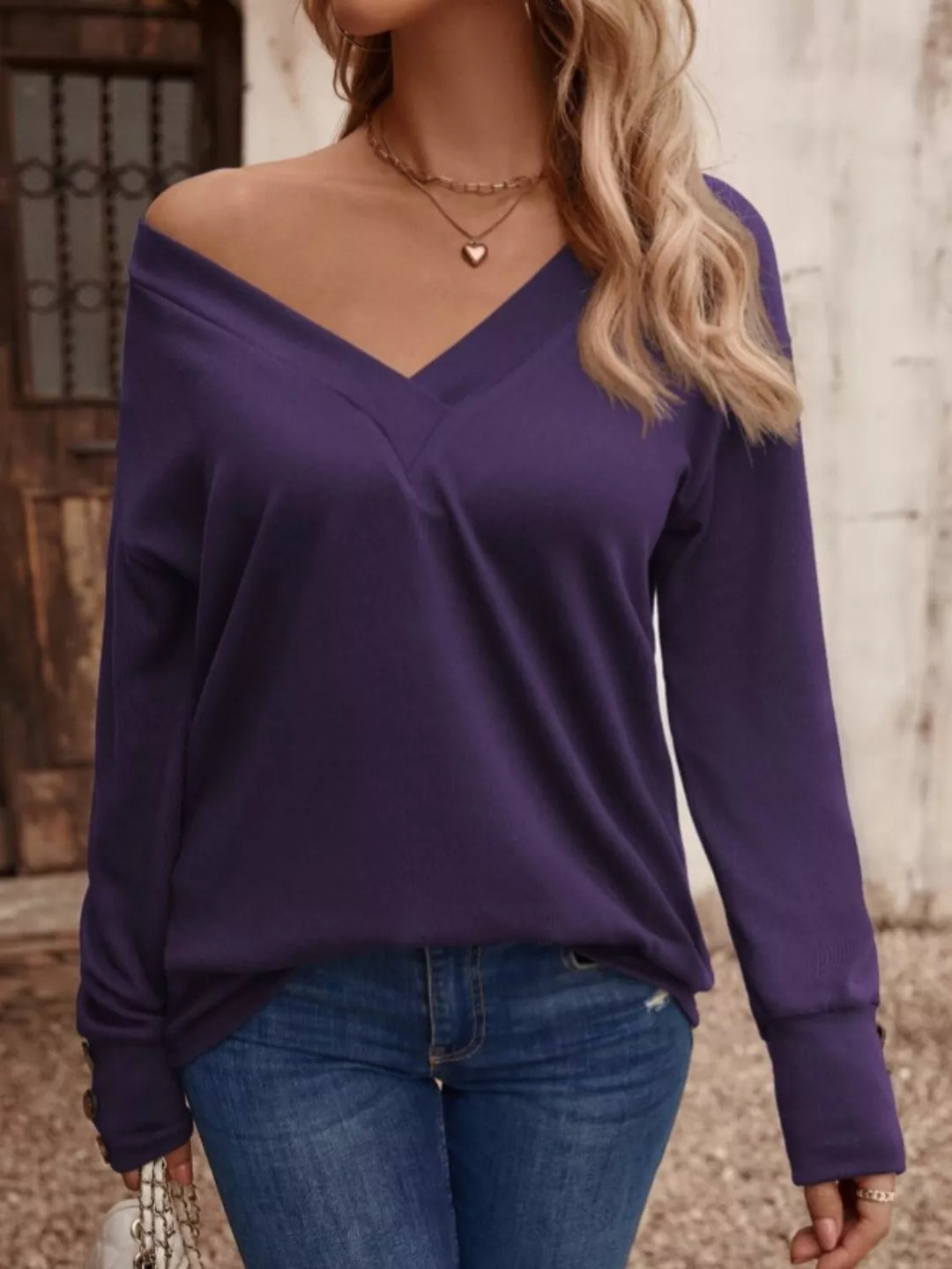 V-neck long sleeve top with button cuffs