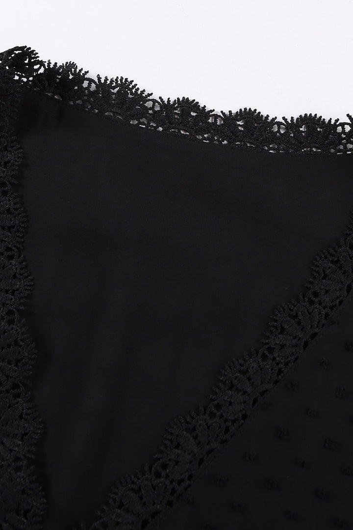 Plus size Swiss dot blouse with crochet lace V-neck