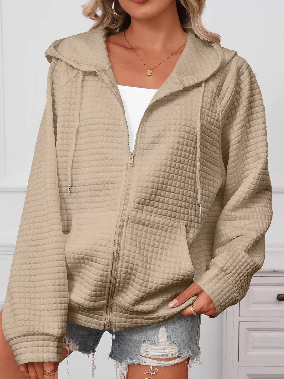 Textured quilted zip-up hooded jacket with pockets