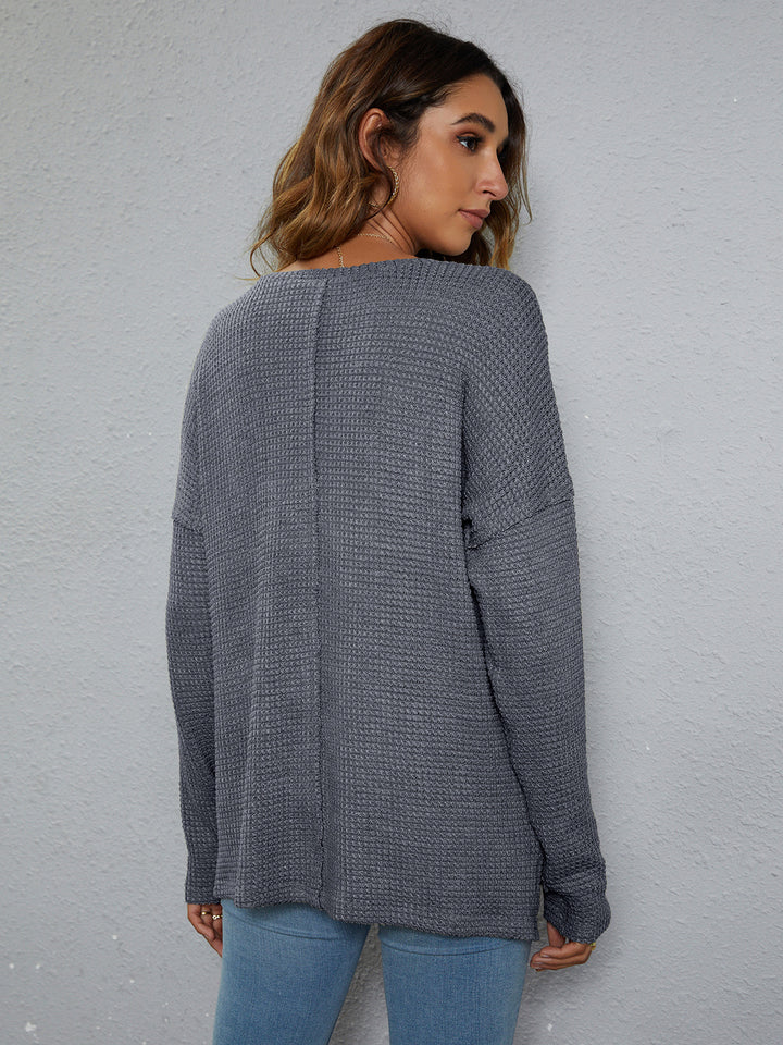 Dropped-shoulder waffle-knit V-neck top with high-low hem