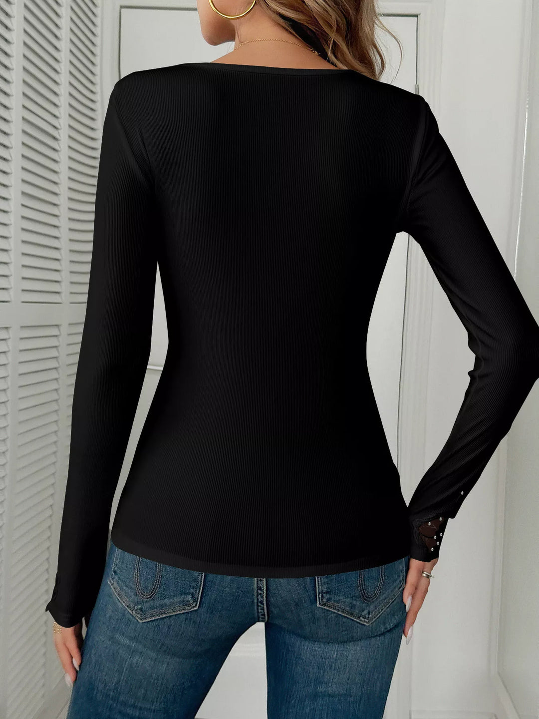 Ribbed knit top with floral lace trim and rhinestones