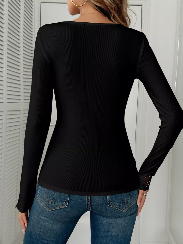 Ribbed knit top with floral lace trim and rhinestones