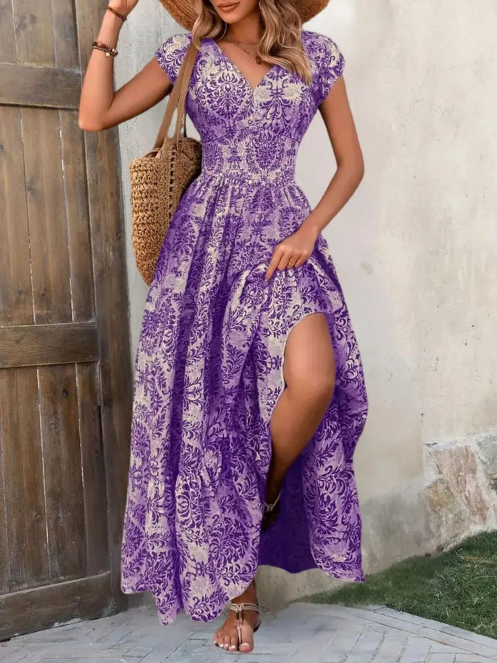Smocked tiered maxi dress with cap sleeves and side slit