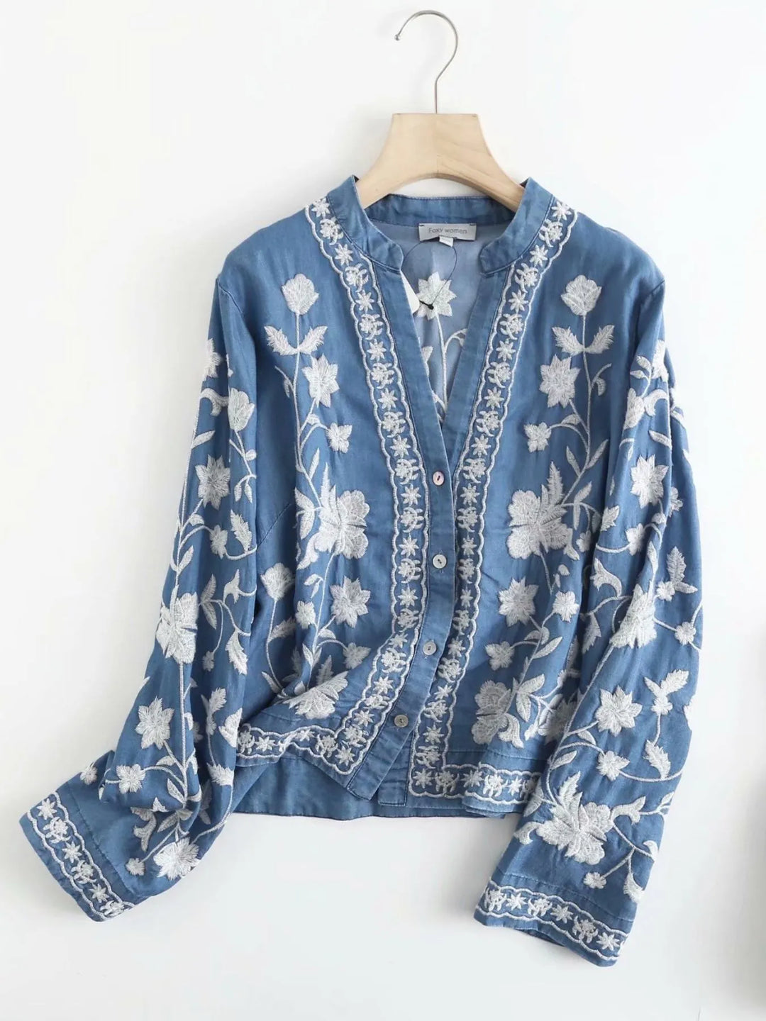 Floral embroidered button-up denim shirt