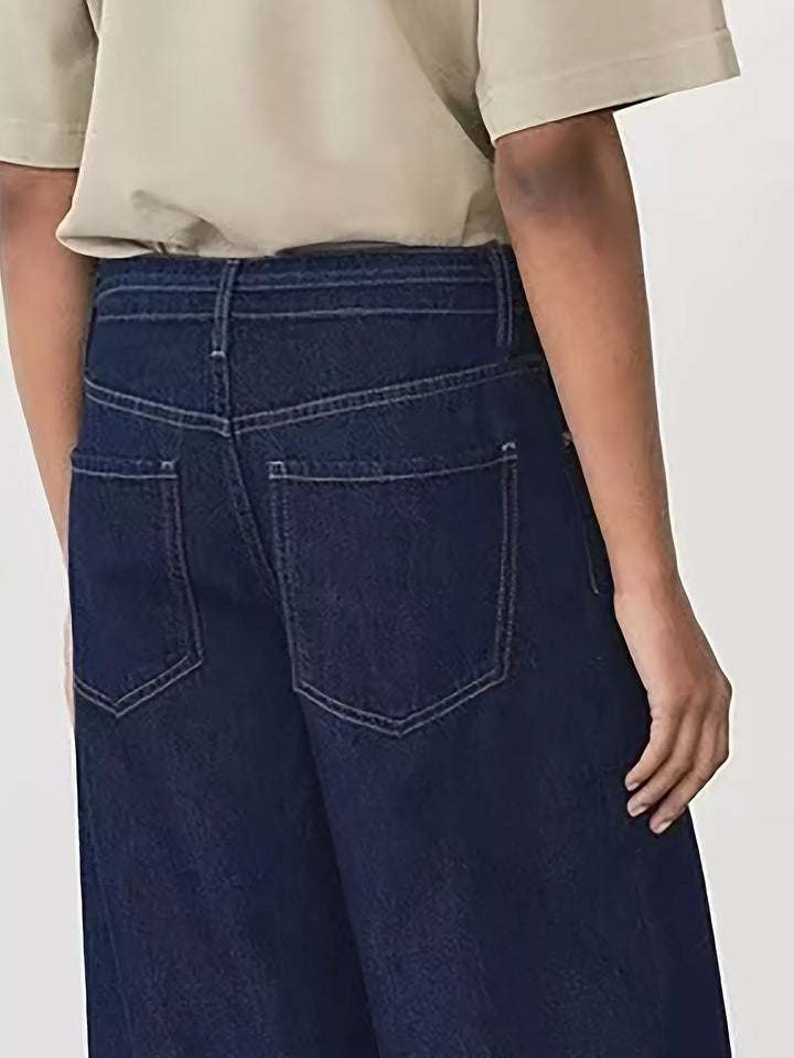 Tied-waist loose flare jeans in rigid cotton denim