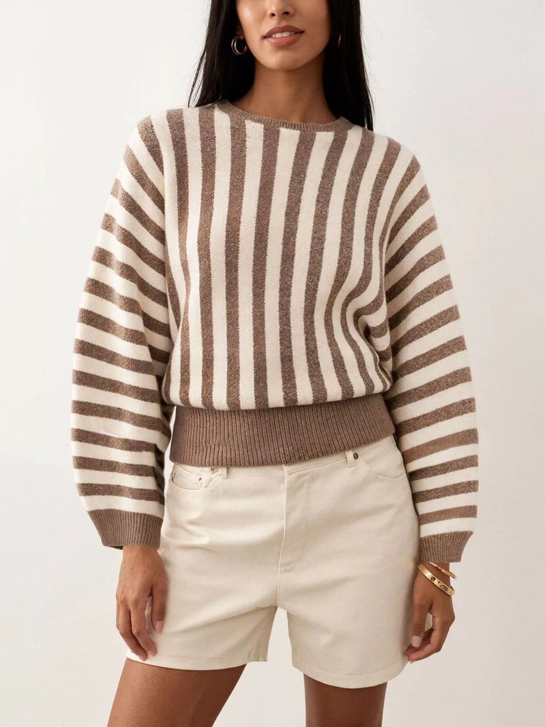 Vertical stripe crew neck sweater with ribbed hem