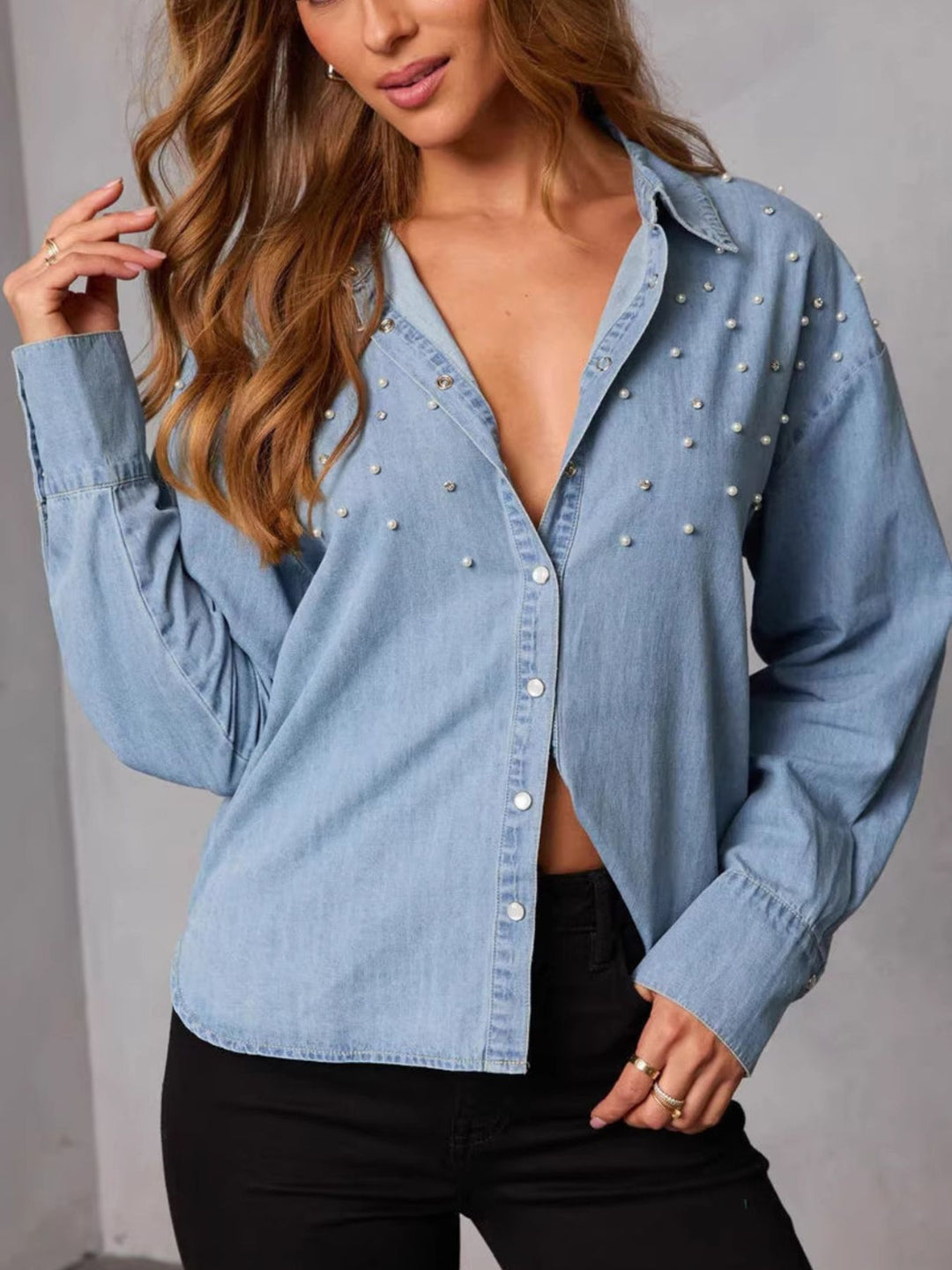 Pearl embellished button-up denim shirt with long sleeves