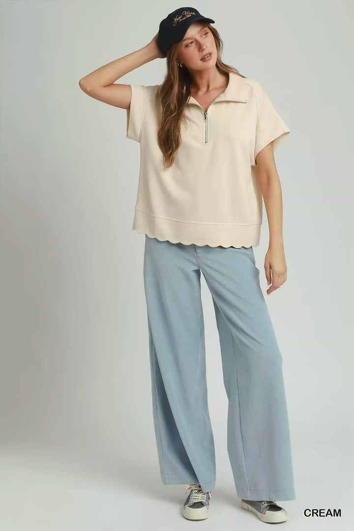 Scalloped hem half-zip short sleeve knit pullover