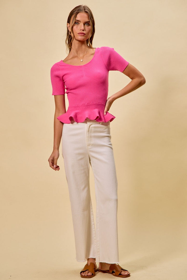 Ribbed knit peplum top with short sleeves and scoop neck