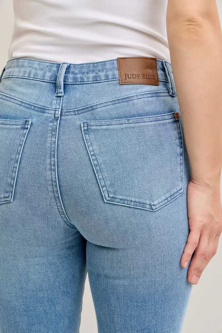 Mid-rise contrast wash bootcut jeans with front patch pockets