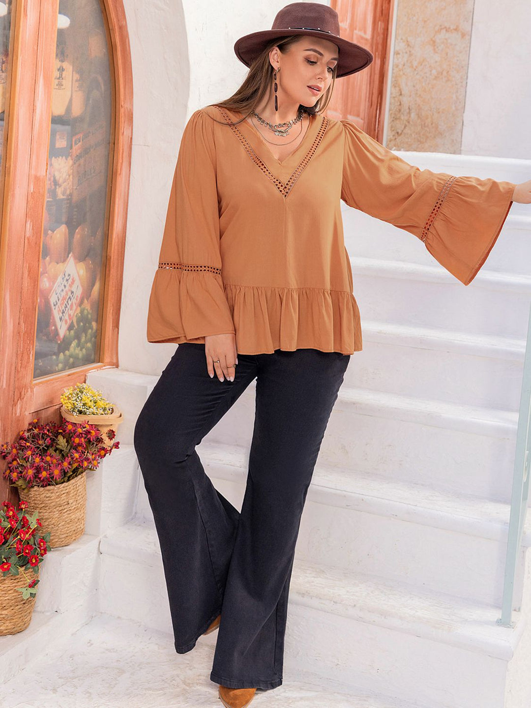 Plus size crochet-trim V-neck peplum blouse with flare sleeves