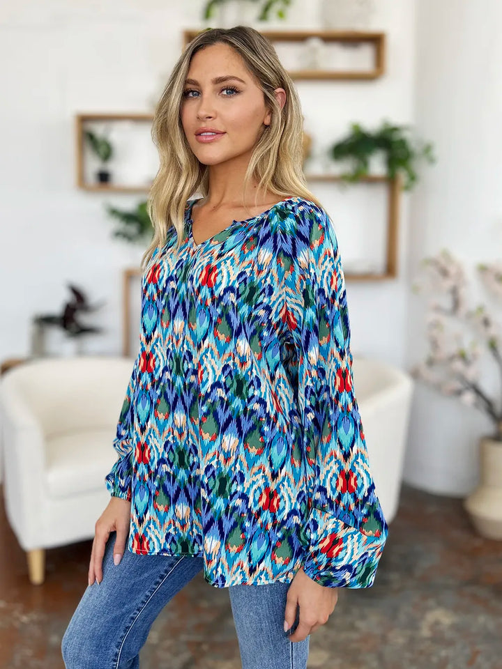 Abstract print balloon sleeve blouse with split neck