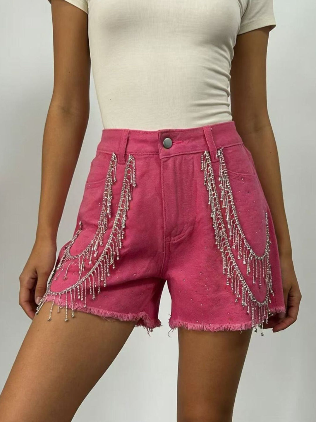 Fuchsia Pink Rhinestone fringe high-rise raw hem denim shorts