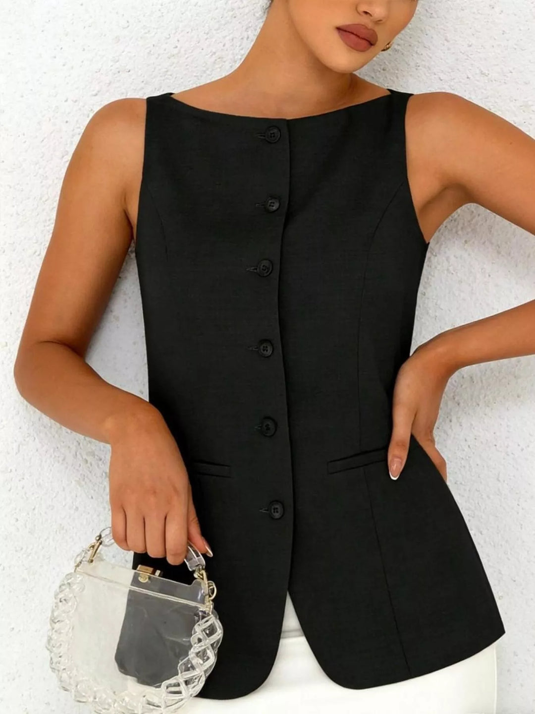 Sleeveless button-down tailored vest with welt pockets