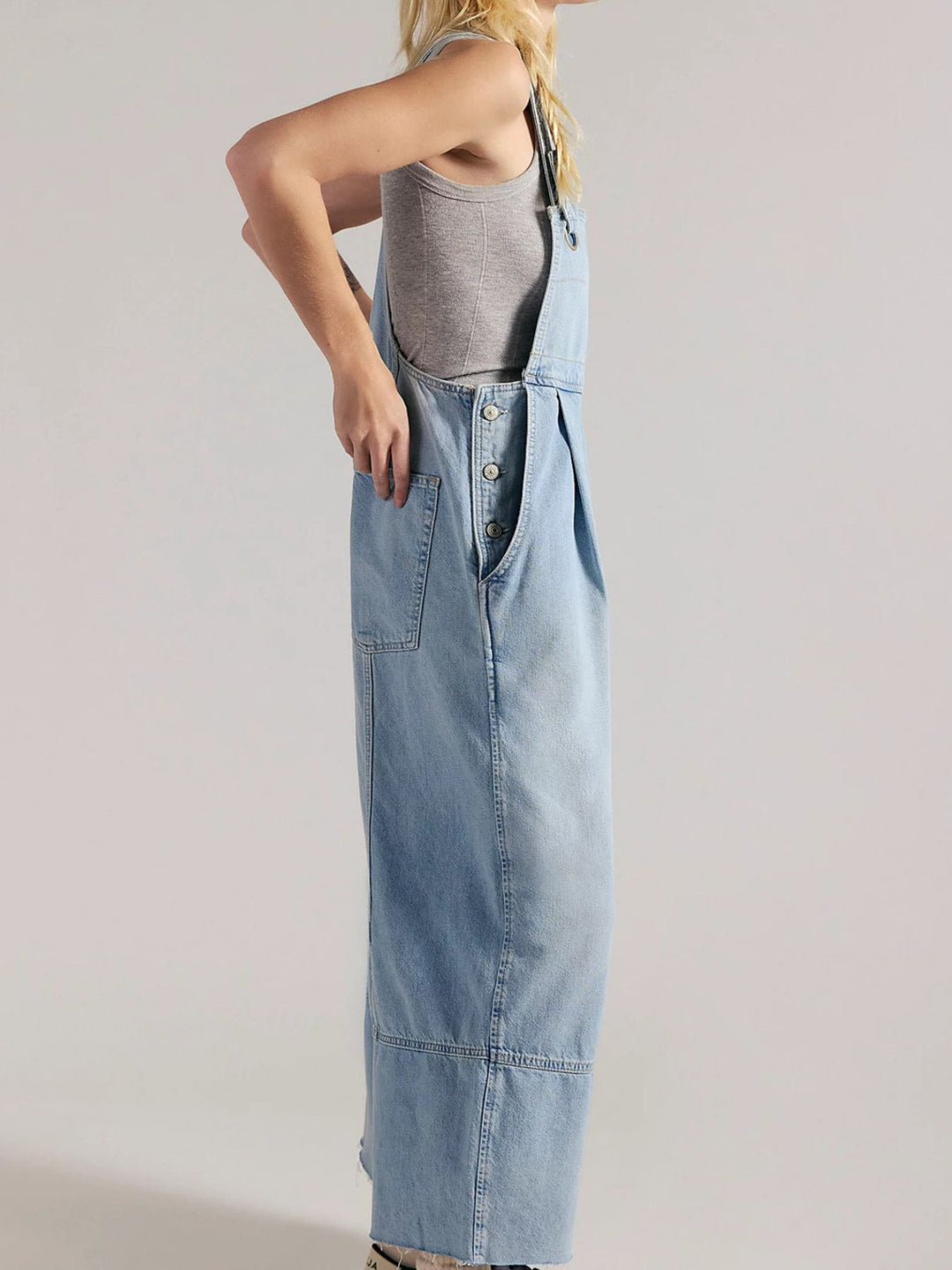 Pleated wide-leg denim overalls with raw hem