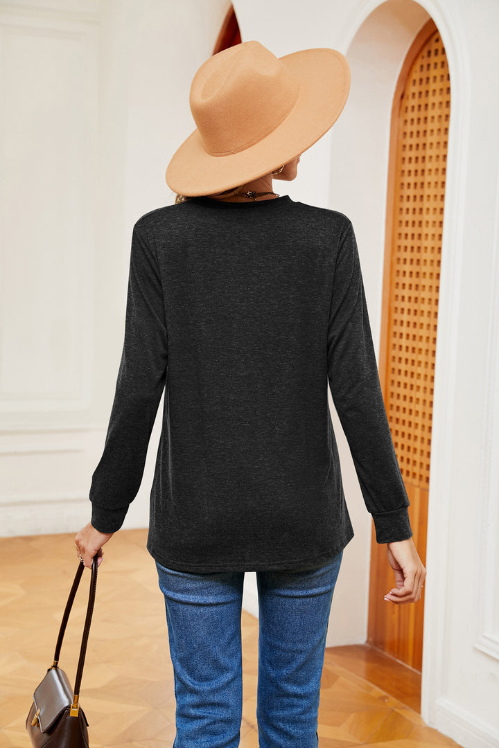 Notch neck long sleeve top with button placket