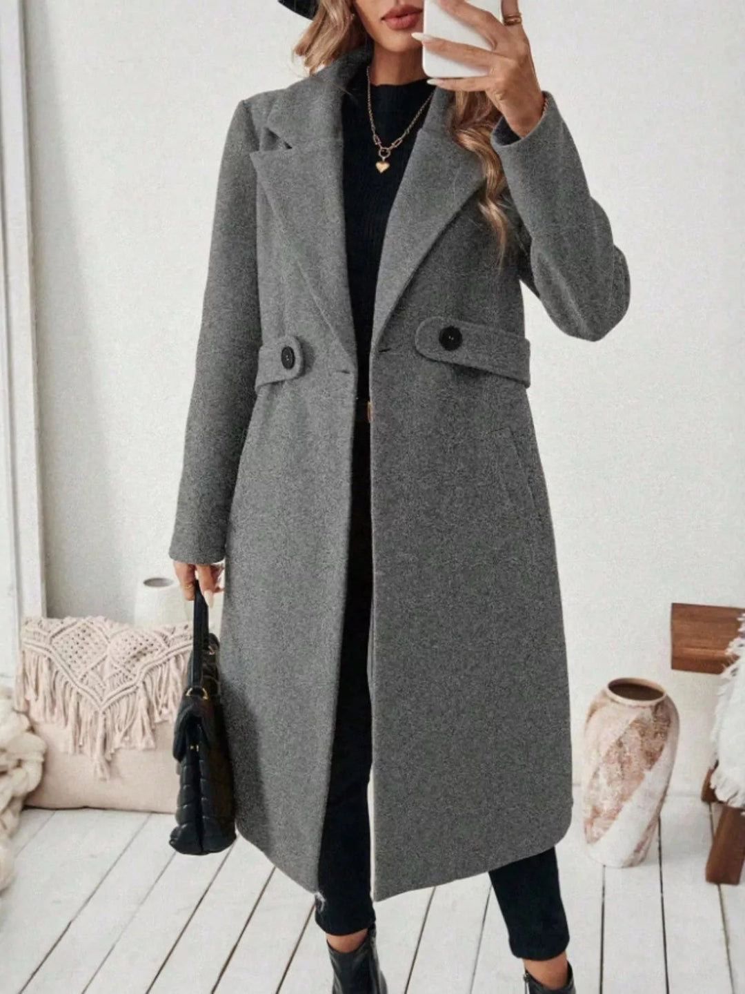 Notched lapel belted longline coat with side pockets