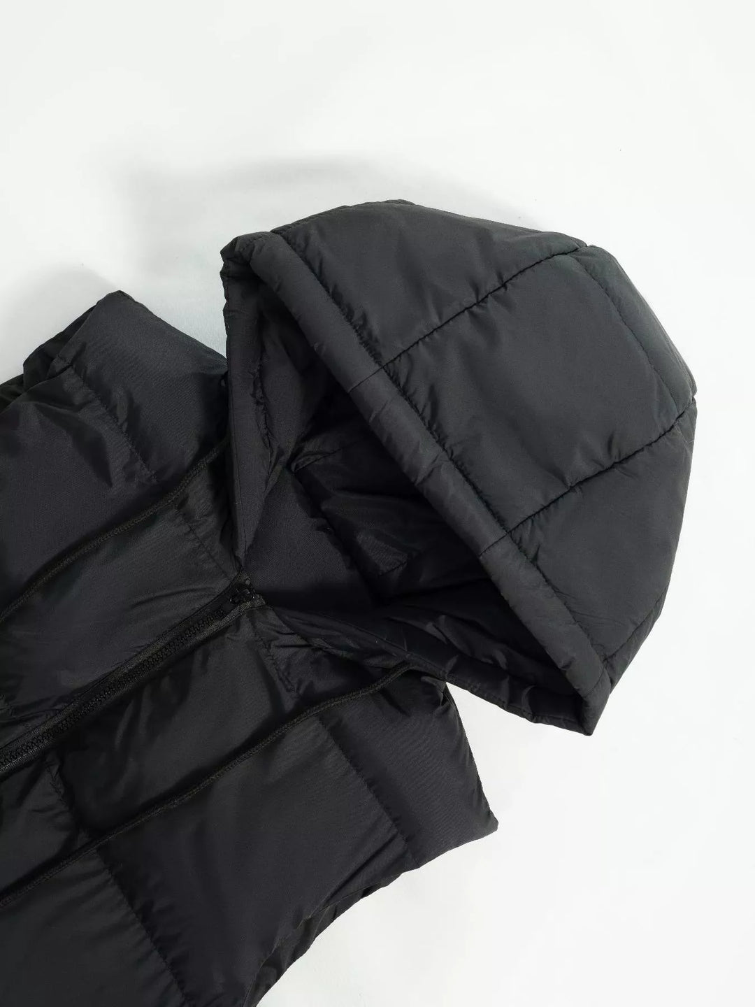 Longline hooded puffer vest with zip pockets