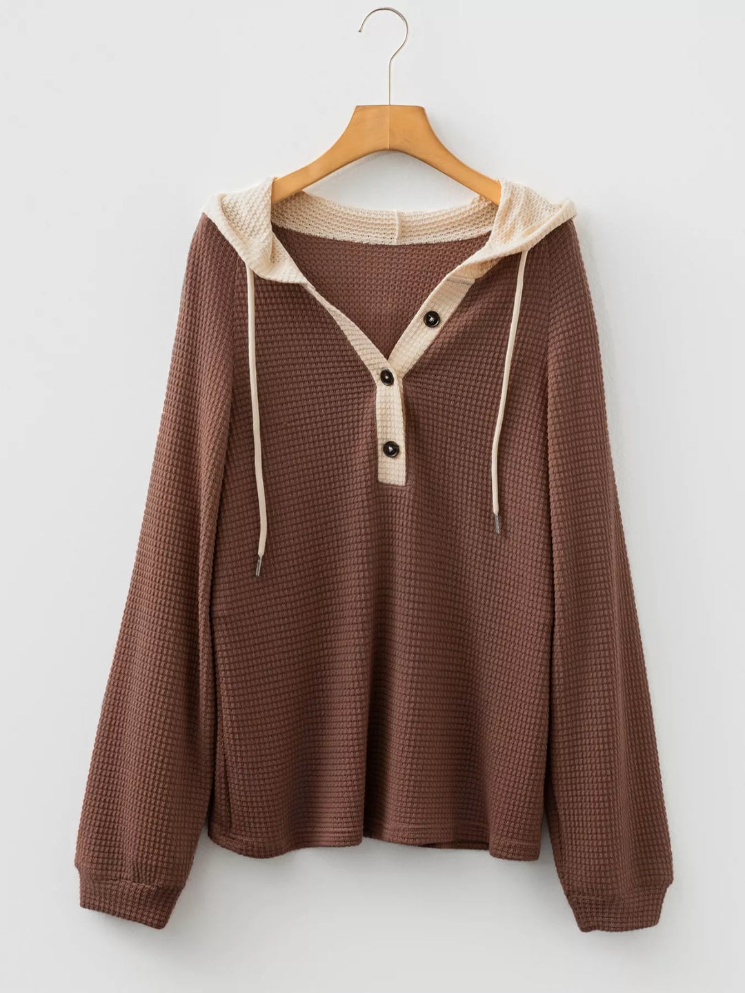 Waffle knit half-button hooded pullover with contrast trim