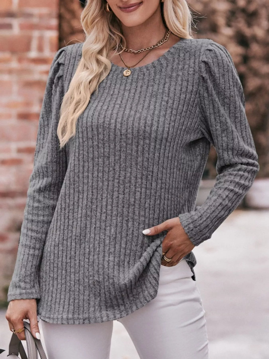 Ribbed knit long sleeve top with puff shoulders