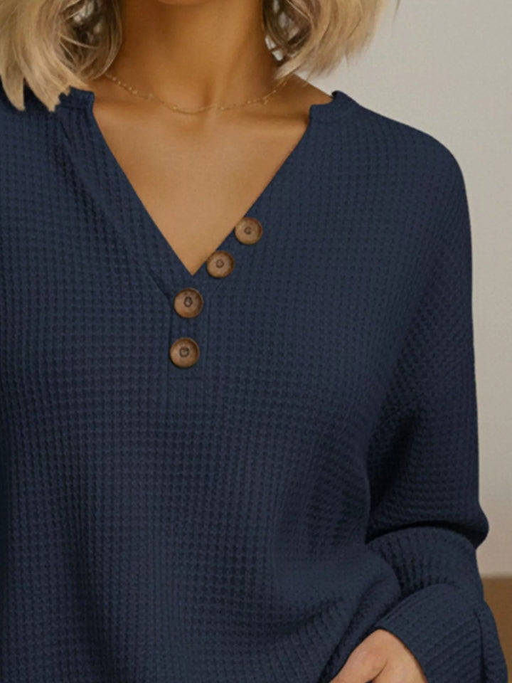 Waffle-knit long sleeve henley top with buttoned V-neck