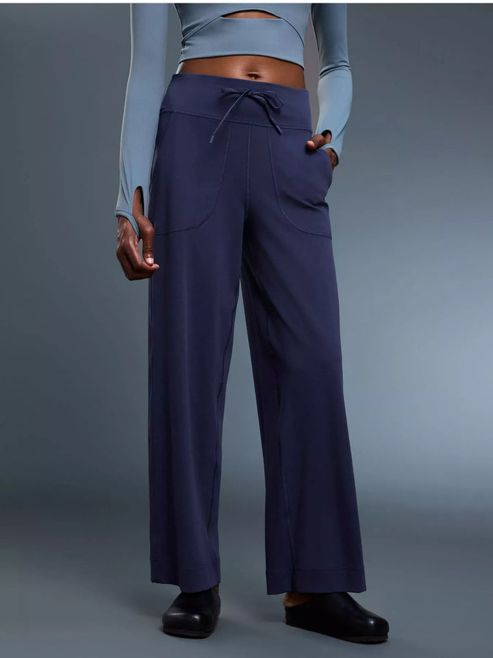Wide-leg drawstring pants with curved front pockets