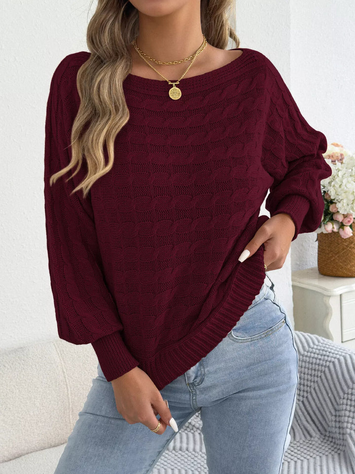 Cable knit boat neck sweater with dolman sleeves