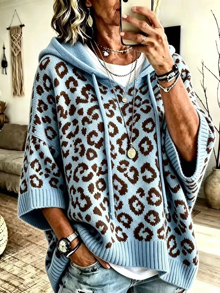 Blue Leopard print drawstring hooded sweater with dolman sleeves