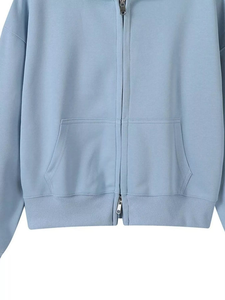 Zip-up hoodie with front pockets and ribbed cuffs