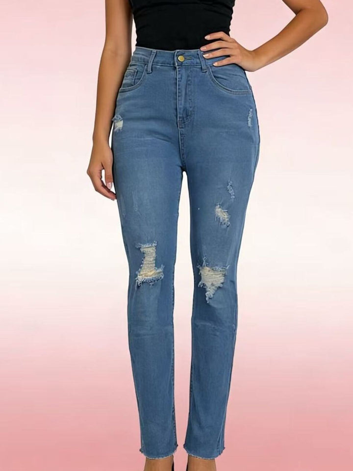 Distressed high-rise skinny jeans with frayed hem