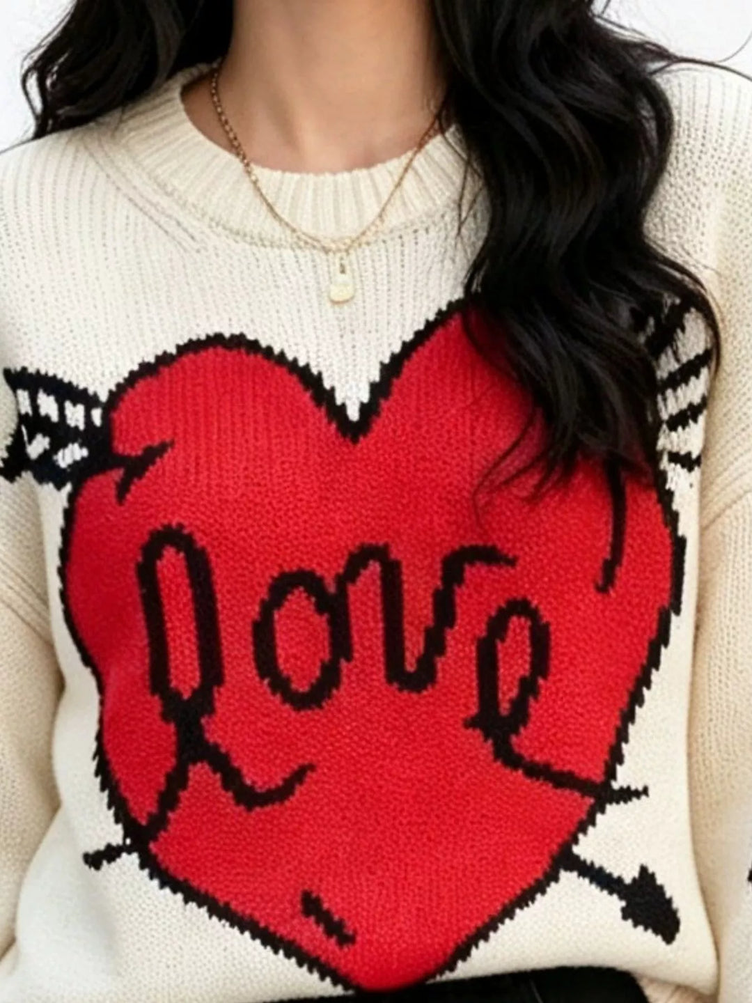 Heart and arrow graphic knit sweater with ribbed trim