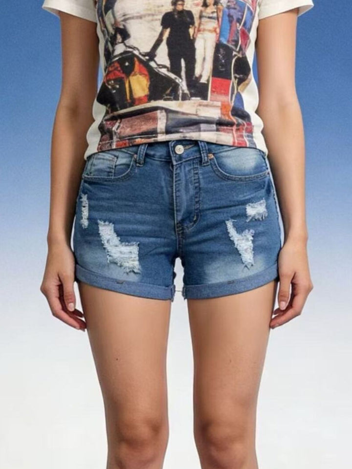 Distressed mid-rise denim shorts with cuffed hem