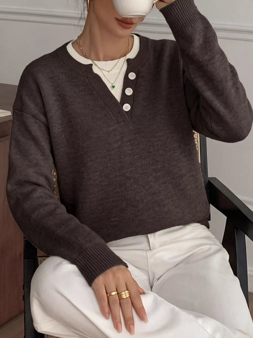 Three-button henley placket knit sweater with ribbed trim
