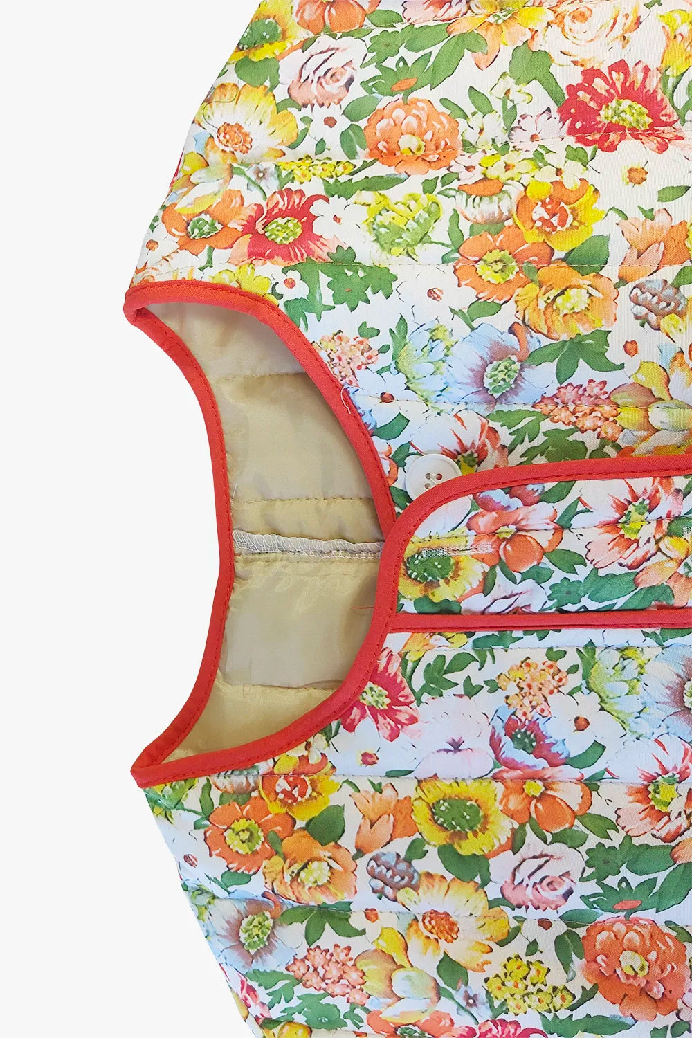 Quilted floral jacket with contrast piped trim and round neck