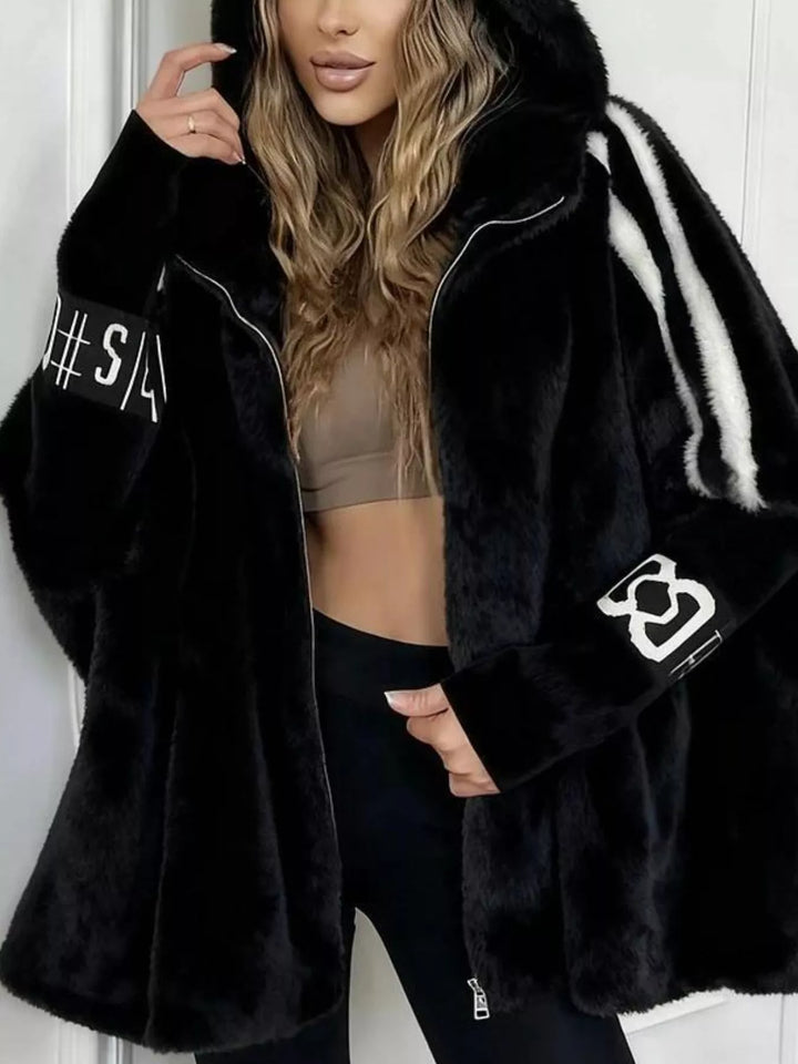 Hooded faux fur coat with striped trim and knit sleeves
