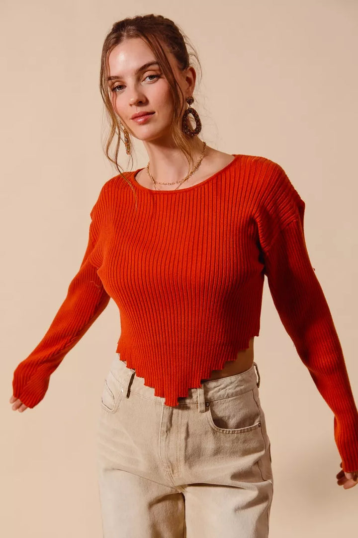 Ribbed knit crop sweater with shaped hem and long sleeves