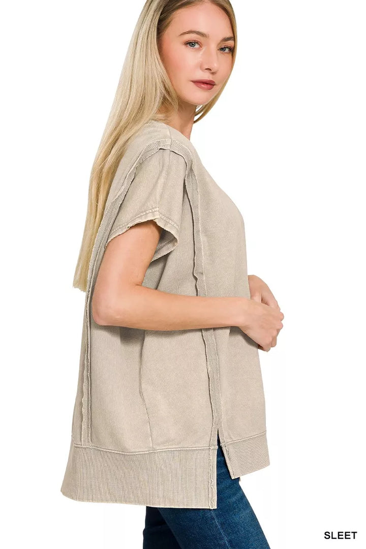 Acid-wash French terry top with exposed seams and hi-low hem