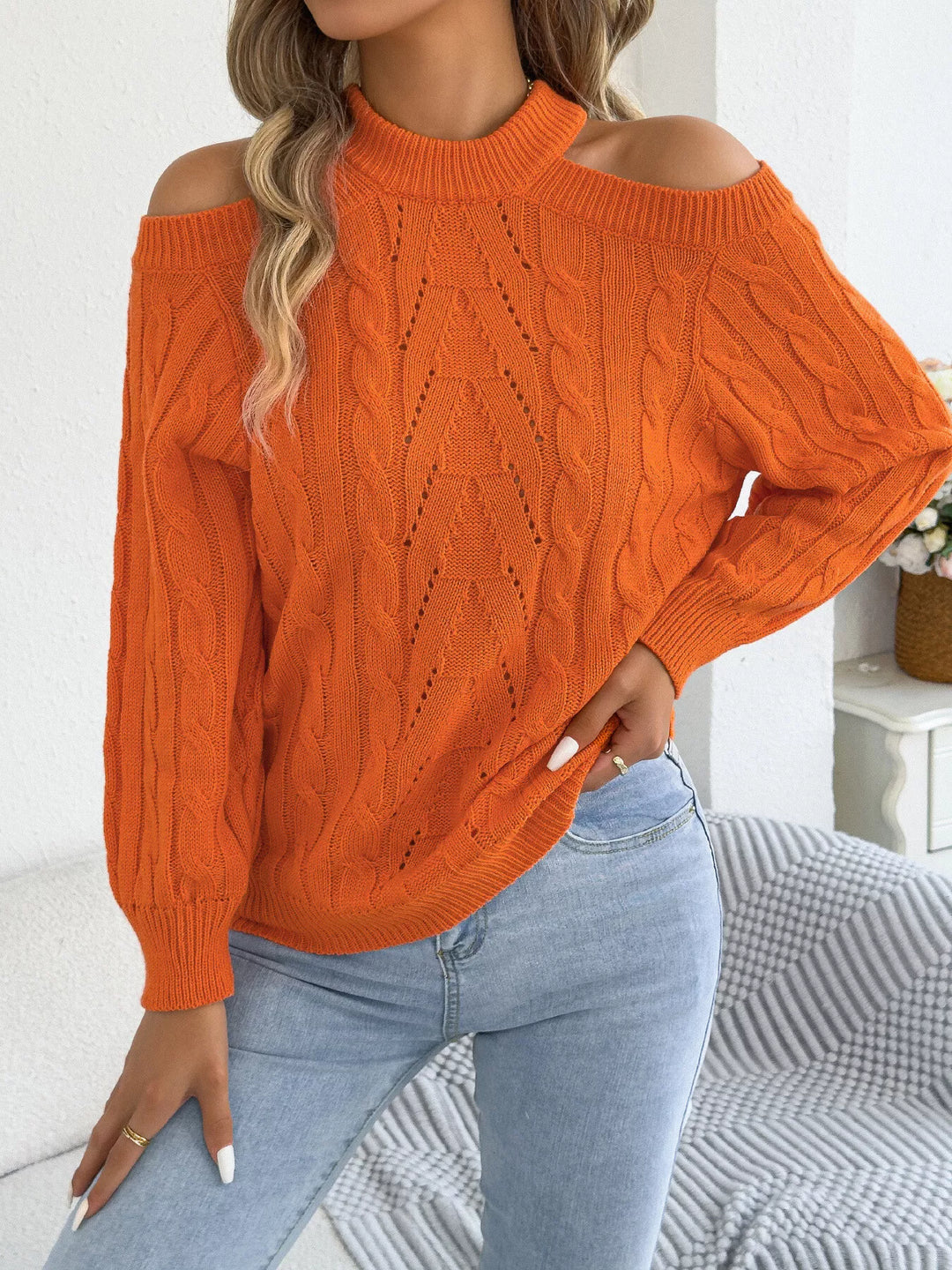 Cold shoulder cable knit mock neck sweater