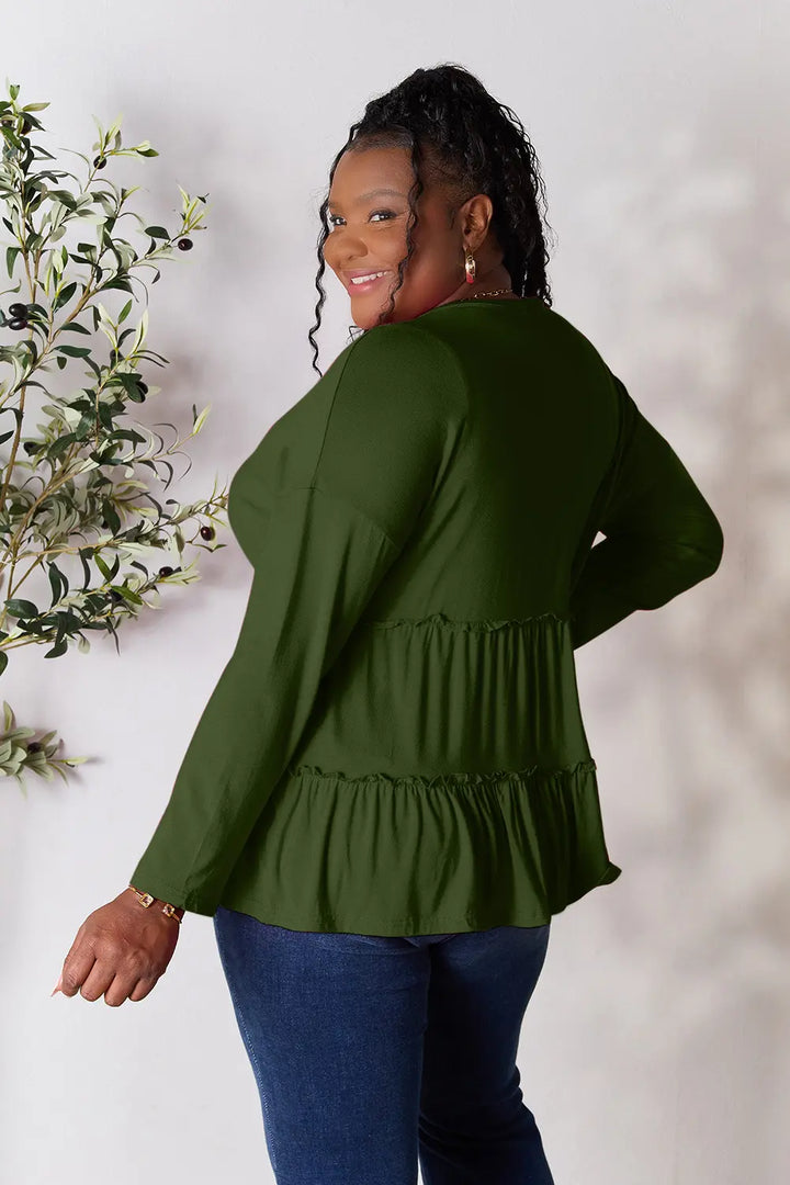 Half-button long sleeve blouse with tiered ruffle hem