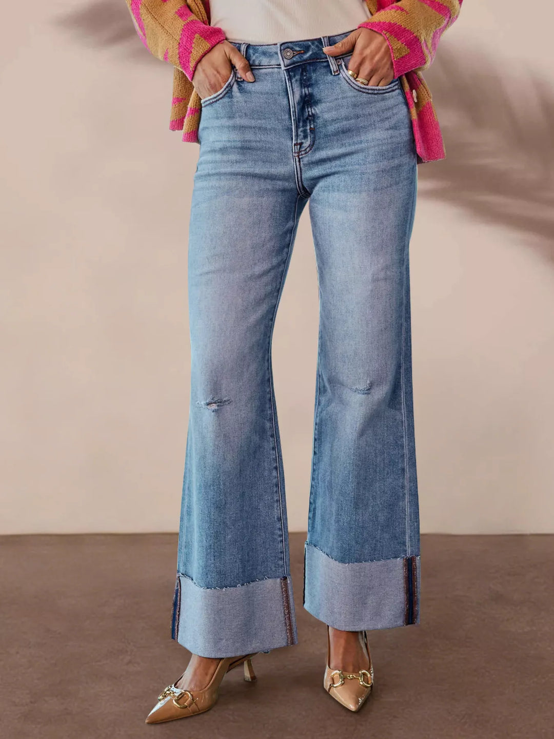 Blue Distressed high-rise flare jeans with raw cuffed hem