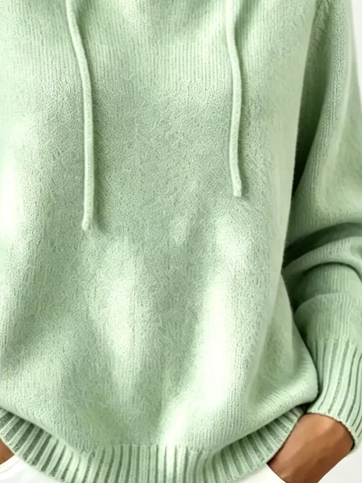 Drawstring hooded knit pullover sweater with ribbed trim