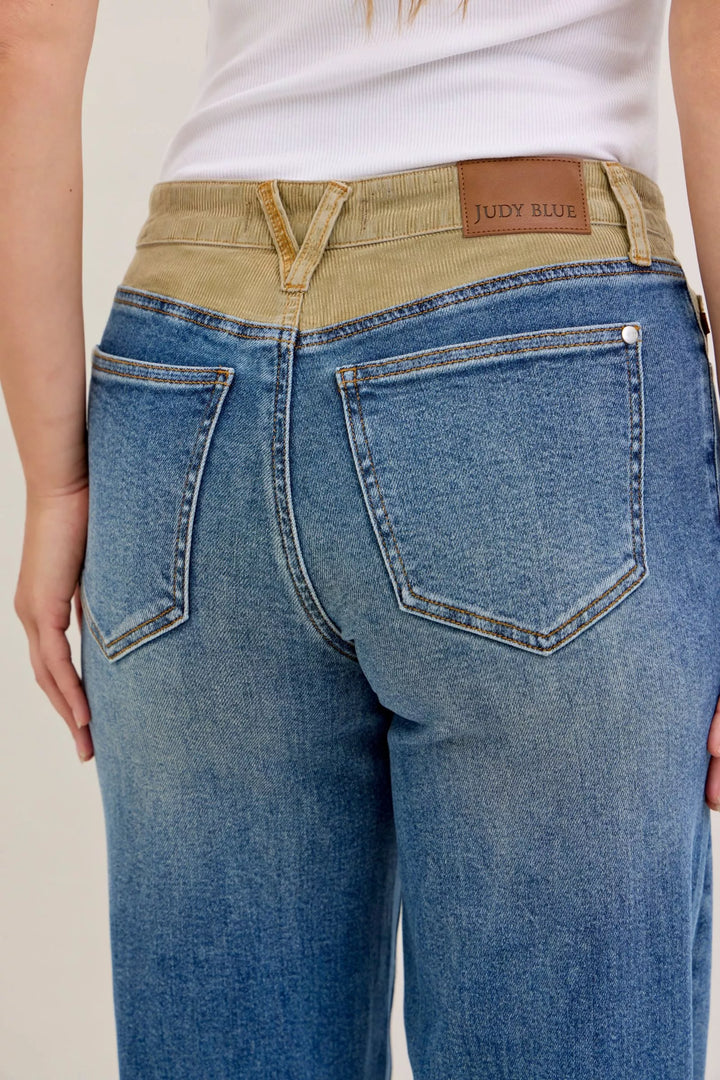 Mid-rise straight leg jeans with corduroy waistband