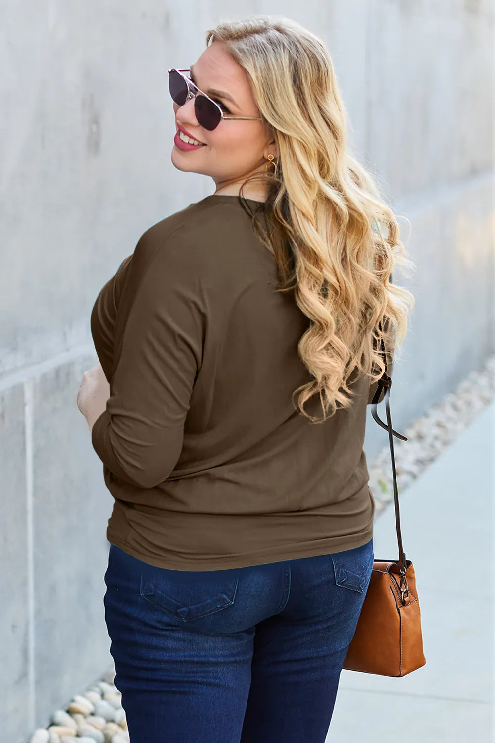 Batwing sleeve top with banded blouson hem