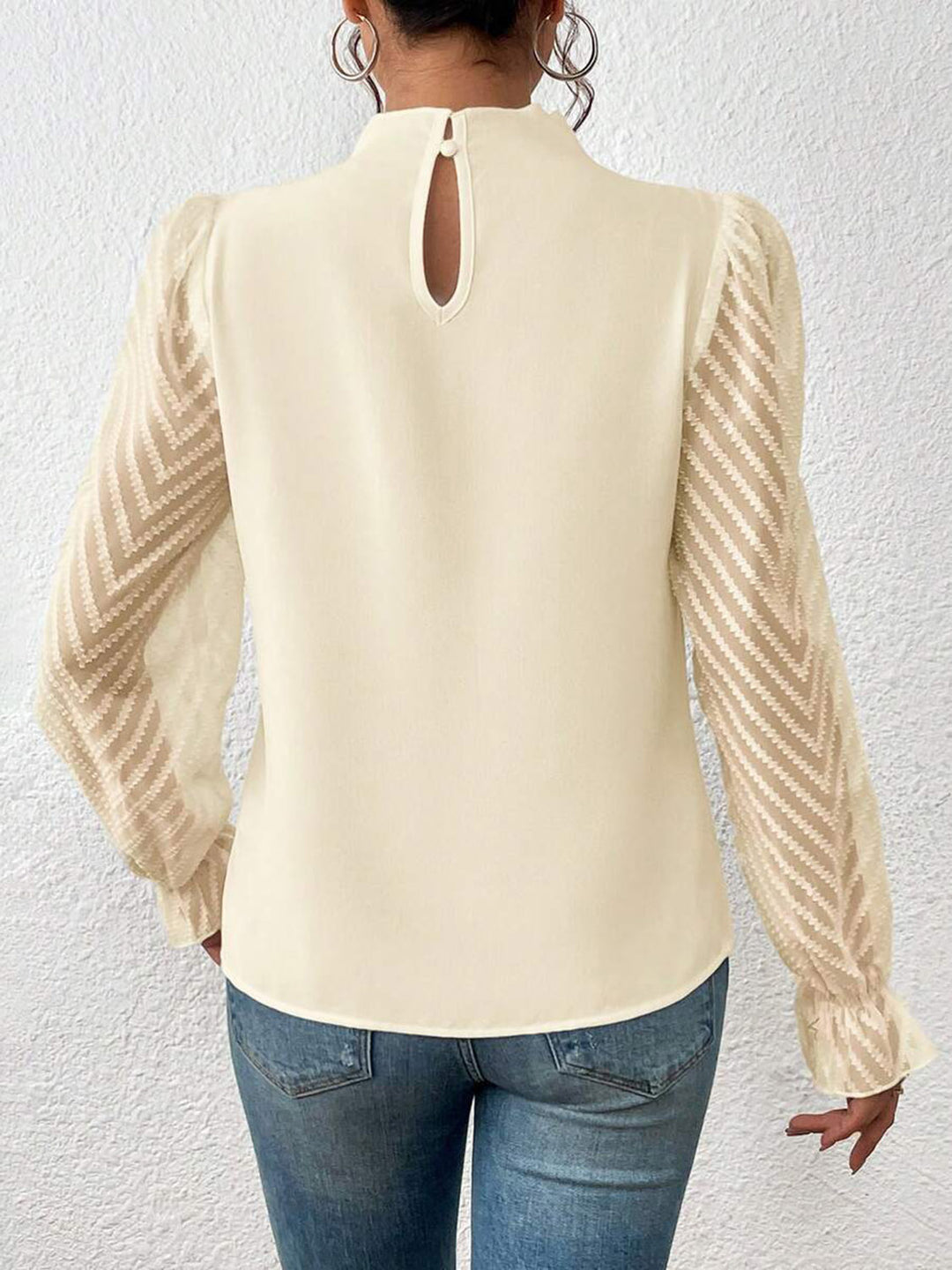 Mock neck blouse with sheer textured flounce sleeves