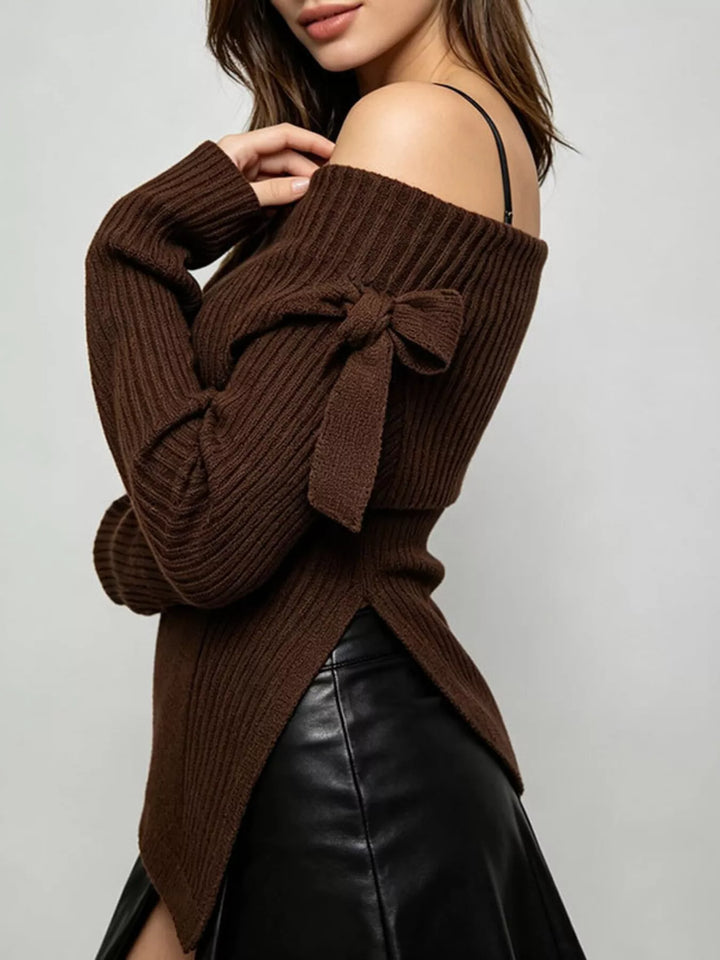 Off-shoulder ribbed knit top with bow cuff and asymmetric hem